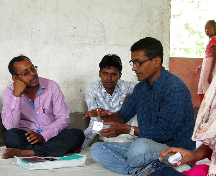 Field team discussion during a community programme